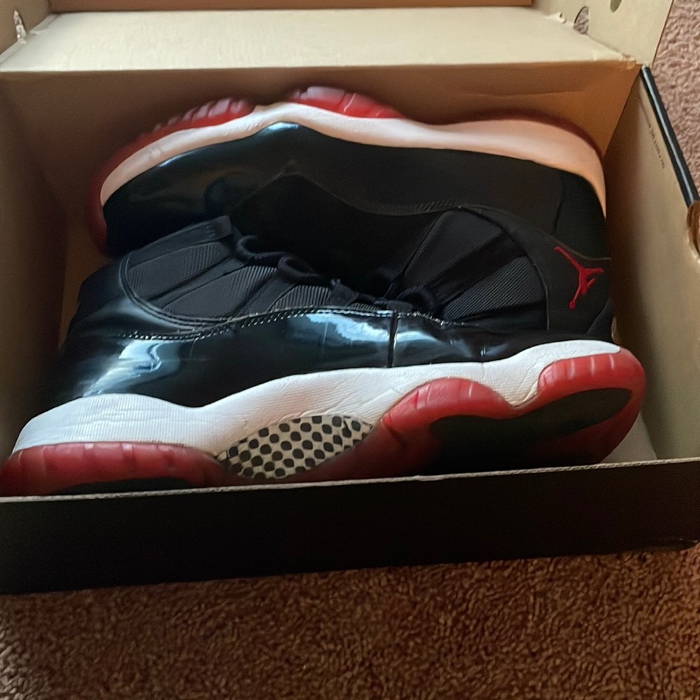 Black, red and white Jordan’s size 10.